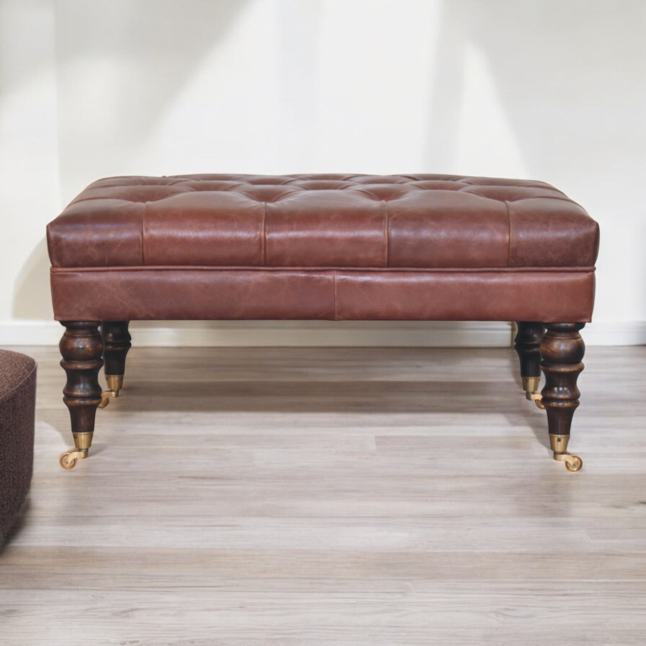 Leather Ottoman with Castor Legs3 Leather Ottoman with Castor Legs3
